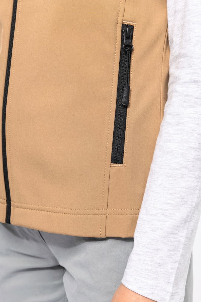 K404 - Damen Softshell Bodywärmer