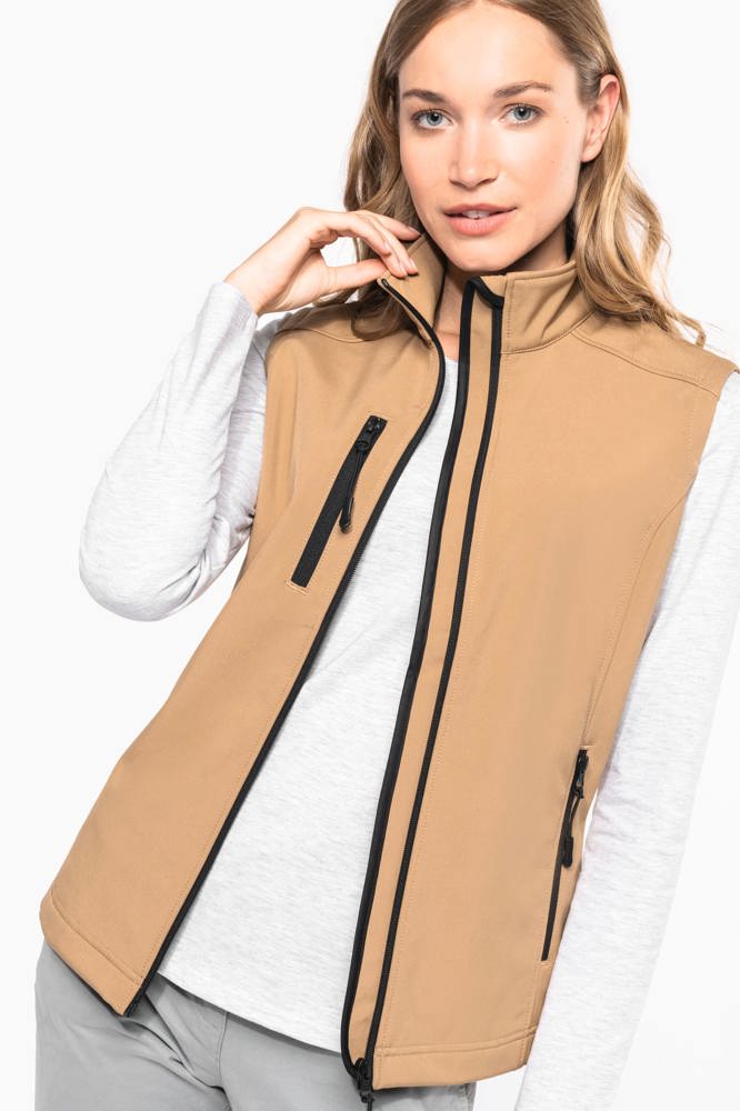 K404 - Damen Softshell Bodywärmer
