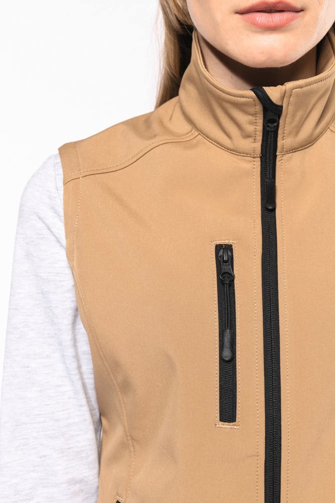 K404 - Damen Softshell Bodywärmer